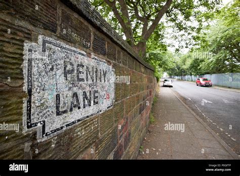 Penny Lane sign made famous by the beatles song covered in graffiti in ...