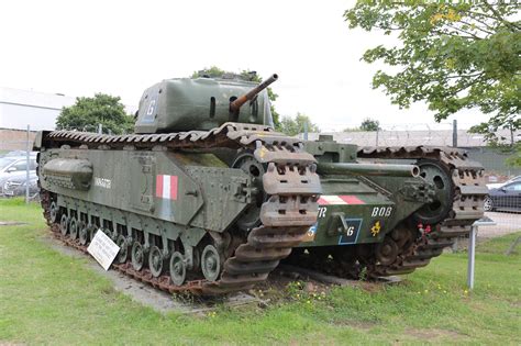 MK1 Churchill infantry tank standing as gate guardian at Bovington ...