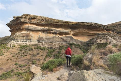 Premium Photo | Tourist trekking on trail in the golden gate highlands national park