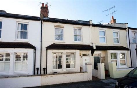 A charming easy to manage three bedroom freehold house for sale in West London with a garden ...