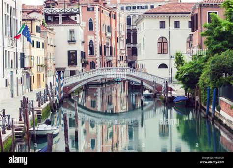 Bridge over canal in Venice Stock Photo - Alamy