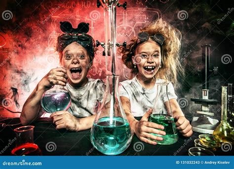 Funny school experimenters stock image. Image of childhood - 131032243