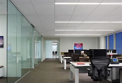 Recessed linear lighting with Armstrong Techzone system (1/2). Gives a ...