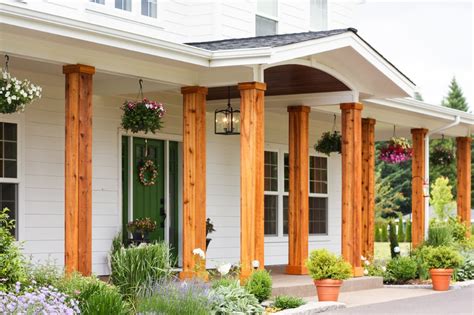 wrap wrought iron porch columns - Google Search | House front porch, Rustic front porch, Front ...