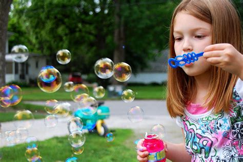 Child Girl Blowing Bubbles HD desktop wallpaper : Widescreen : High Definition : Fullscreen