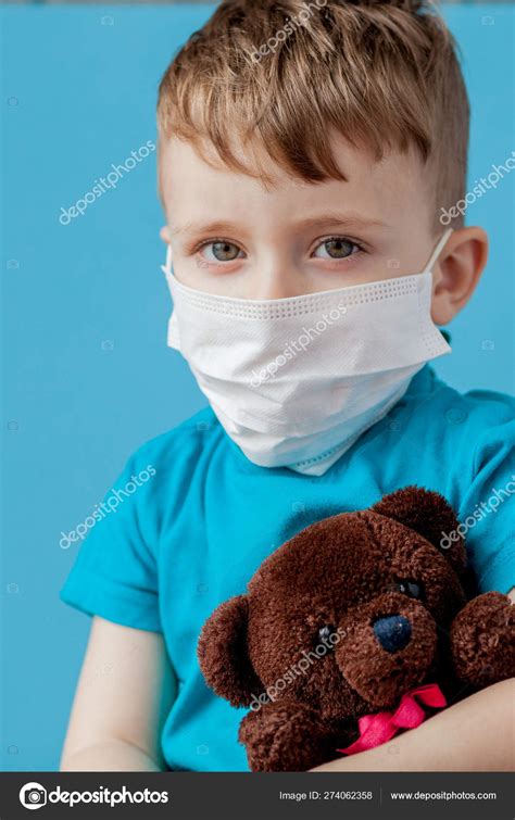 Cute little boy using nebulizer on blue background. Allergy conc Stock Photo by ©volody100@ukr ...