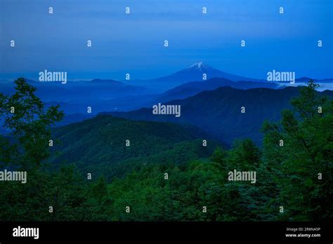 Mount Fuji in front of a sunrise Stock Photo - Alamy