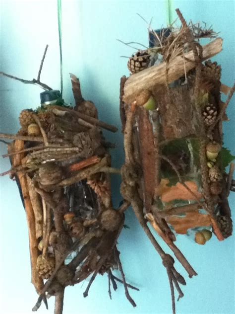 Birdhouses made from recycled plastic 2 liter bottles. Bark, sticks ...