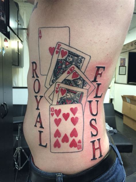 a man's stomach with four playing cards on it and the words royal flush ...