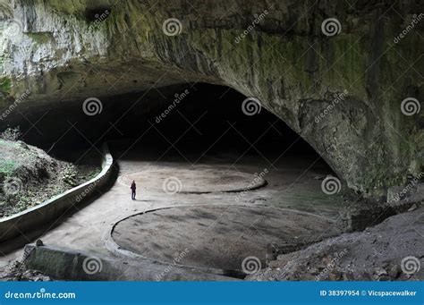 Woman Inside Devetashka Cave Stock Photo - Image of spelaeology ...