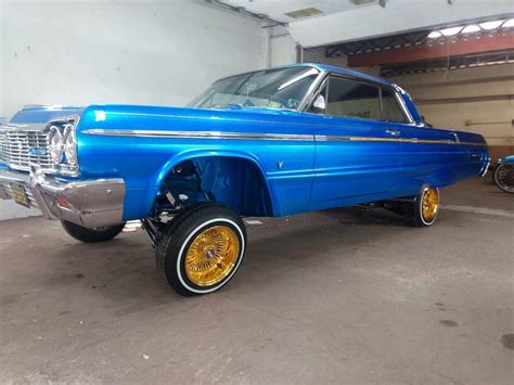 64 Chevy Impala Low low Locked Up....... | 64 impala lowrider, Hydraulic cars, Donk cars