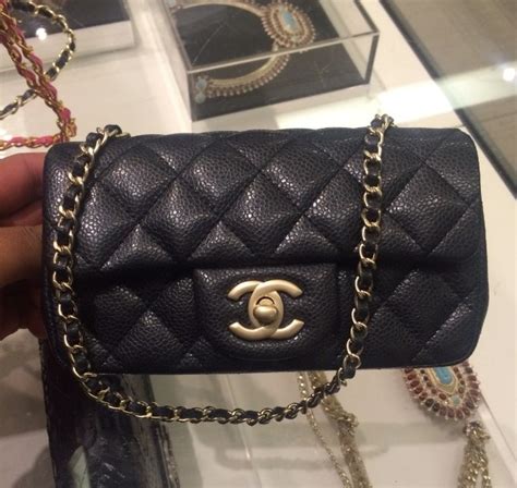 Chanel Extra Mini Classic Flap Bag Reference Guide - Spotted Fashion