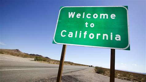 Fake highway signs jab at new California immigration law