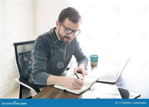 Man writing book at home stock image. Image of author - 117750233