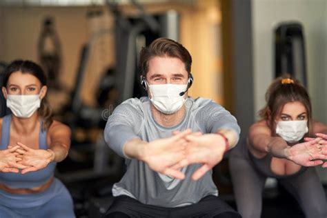 Group of People Wearing Masks Working Out in a Gym Stock Image - Image ...