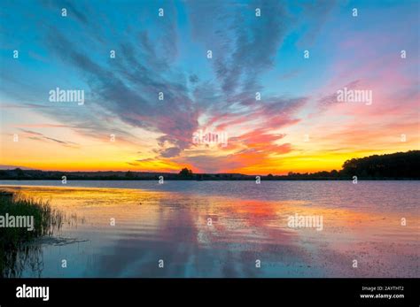 beautiful sunrise on the autumn lake Stock Photo - Alamy