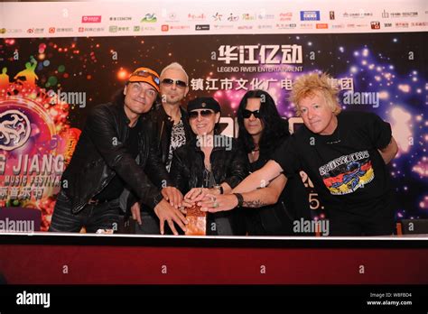 Members of German rock band Scorpions pose during a press conference ...