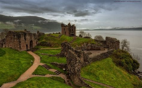 Urquhart Castle on Loch Ness This ancient castle is located near the village of Drumnadrochit, a ...