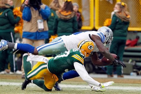 Aided by overturned Dez Bryant catch, Packers beat Cowboys 26-21 in NFC ...