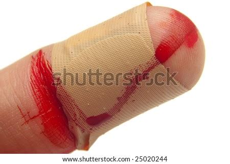 A Bleeding Finger Tip Is Covered With A Bandage. Stock Photo 25020244 : Shutterstock