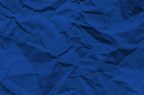 Download Blue Paper Background With Crumpled Paper | Wallpapers.com