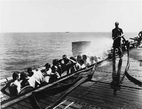 Crew of U-505 being hosed down on USS Guadalcanal (CVE-60)