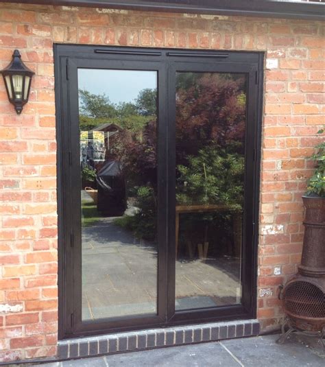 small set of bifolding doors on a patio | Bifold patio doors, Patio ...