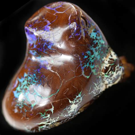 346.60 CTS BOULDER OPAL CARVING [BMA4503]