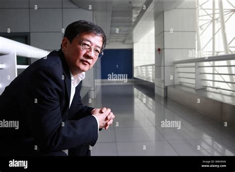 --FILE--Ren Jianxin, Chairman of ChemChina (China National Chemical Corporation), poses at the ...