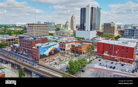 Fort Wayne, Indiana (USA) downtown city skyline with train tracks and bison mural Stock Photo ...