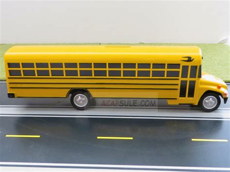 Blue Bird 10.25 Inches School Bus Plastic Toy Bank with Rolling Wheels ...