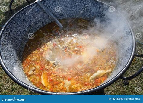 Very Large Cauldron Cooking Food during Campfire. Cooking in a Pot on ...