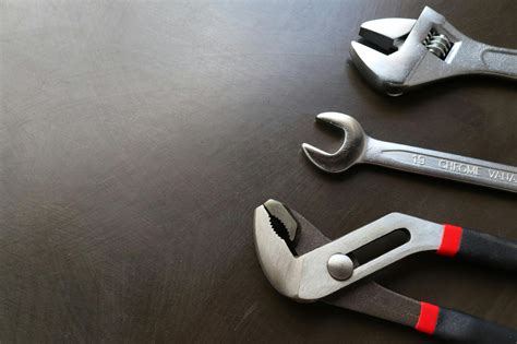 Different Wrenches on Workbench · Free Stock Photo