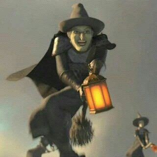 Witches Flying in the Air with Lantern and Broom