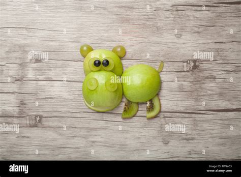 Hippo made of fruits on wooden background Stock Photo - Alamy