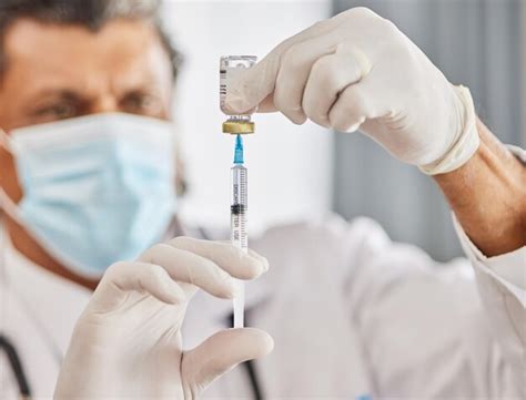 Premium Photo | Healthcare vaccine and closeup of a doctor with a ...