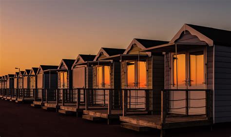 Beach Huts Sunset Photograph by Sonia Bashir