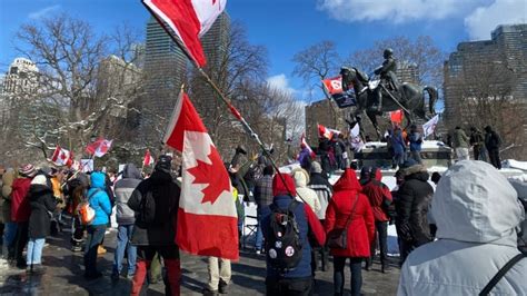 Protesters against COVID-19 measures march in Toronto after gathering ...