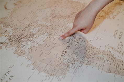 Finger Pointing To A Map - Stock Photos | Pearl