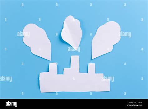 paper factory on blue background. environmental pollution concept Stock Photo - Alamy