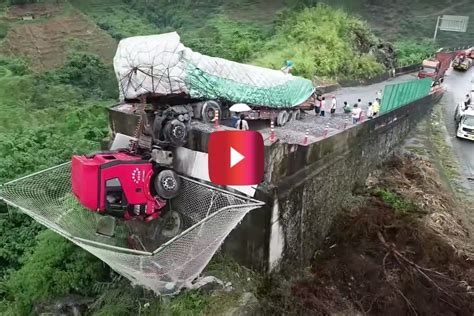 Semi Falls Off Runaway Ramp, But This Huge Net Saved 2 Lives - alt_driver