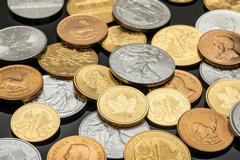 Collection of Silver and Gold Round Coins · Free Stock Photo