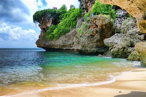 Bali, Indonesia-untouched beaches of Bali surrounded by lush jungles ready for exploring may ...