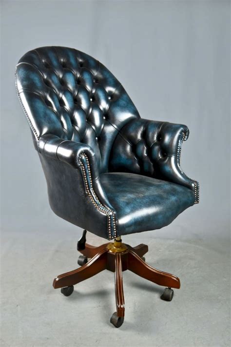 Blue leather & buttoned high back swivel chair - The Classic Prop Hire ...