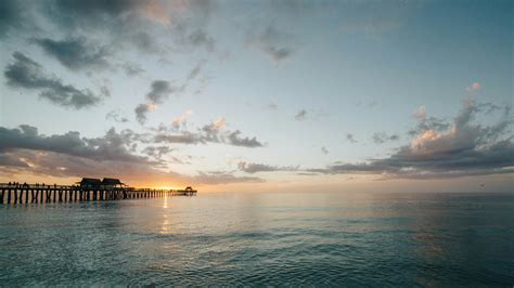 Scenic View of Sea Against Cloudy Sky · Free Stock Photo