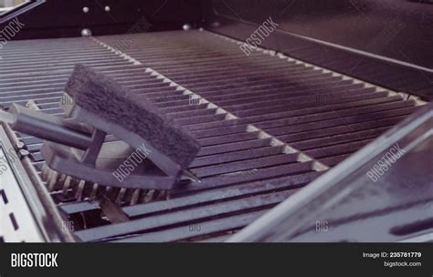 Cleaning Gas Grill Image & Photo (Free Trial) | Bigstock