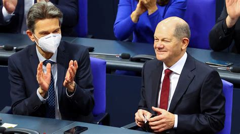 Germany: Olaf Scholz replaces Angela Merkel as chancellor after 16 ...