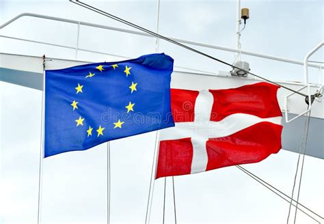 The Flags of the EU and the State of Denmark Side by Side on a Mast of ...