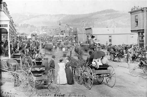 an old black and white photo of people in horse drawn carriages on a ...