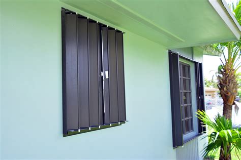 Accordion Shutters | Ez Lock Shutters & Glass INC